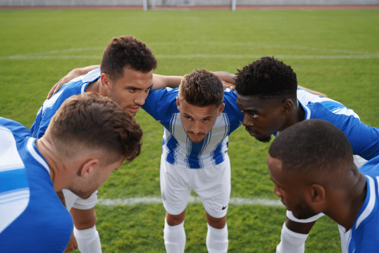 Sports team strategising and planning their next decisive play together