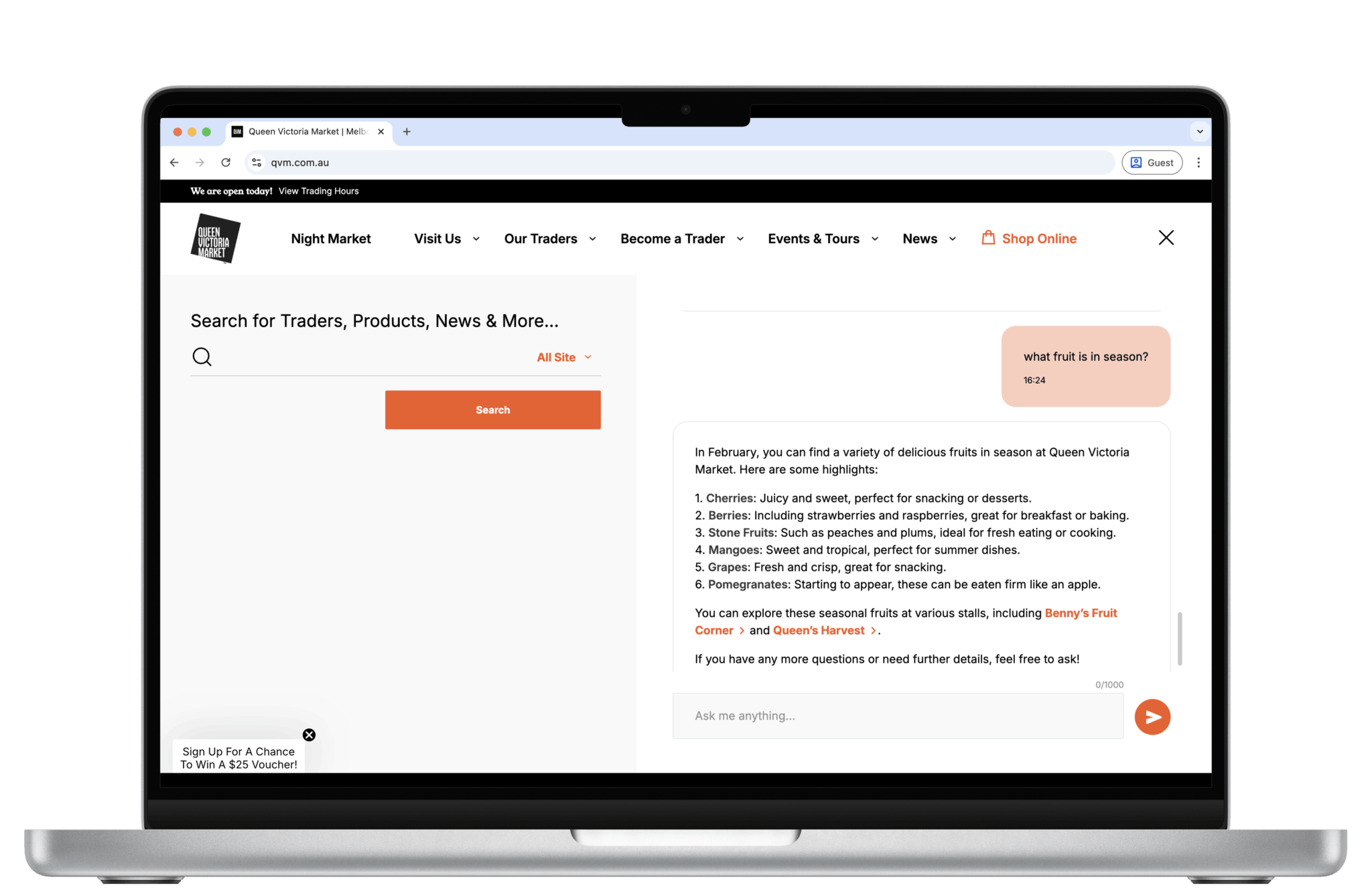 A laptop screen displaying the Queen Victoria Market website, featuring a search bar for traders and products on the left and a chat interface on the right listing seasonal fruits such as cherries, berries, stone fruits, mangoes, grapes, and pomegranates.
